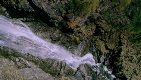 Overhead-View-Of-Steep-Rocky-Cliffs-With-Cascades