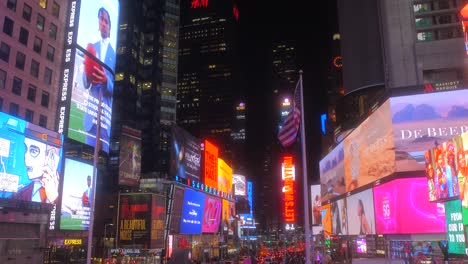 Bright-Lights-On-Busiest-Junction-Of-Times-Square-During-Night-In-Manhattan,-New-York-City,-USA