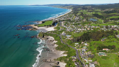 Flying-Over-Scenic-Seaside-Town-In-Brighton,-Dunedin,-New-Zealand