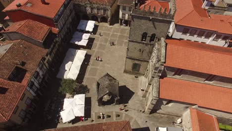 Drone-Flying-Over-Oliveira-Church-in-Guimarães,-Portugal