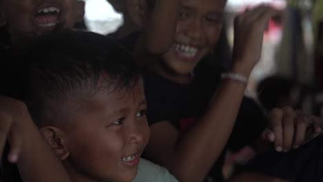 native-kids-from-Indonesia-dancing-and-jumping-around-happy