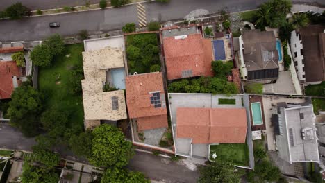 Aerial-view-above-middle-class-houses-in-cloudy-Sao-Paulo,-Brazil---top-down,-drone-shot