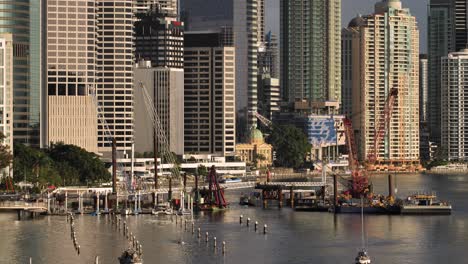 Construction-works-of-a-river-bridge-in-Brisbane-City-from-Kangaroo-Point,-Queensland,-Australia