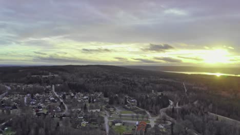 Drone-footage-panning-across-Stråssa-village-in-Sweden-at-winter