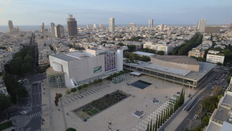 Parallax-above-the-habima-square-while-people-relax-and-rest-below---Tel-Aviv,-Israel