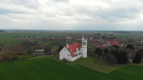 aerial-view-of-church-of-slovenian-architect-jozef-plecnik-in-Slovenia-countryside