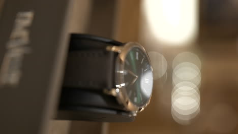 VERTICAL-Close-up-stylish-Baume-Mercier-brand-luxury-watch-on-display-for-sale-in-jewellery-store