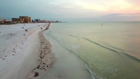 Drone-Footage-over-Beach-Shoreline-in-Clearwater,-Florida
