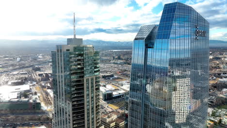 Aerial-flight-between-Optiv-building-and-Four-Season-Hotel,-downtown-Denver