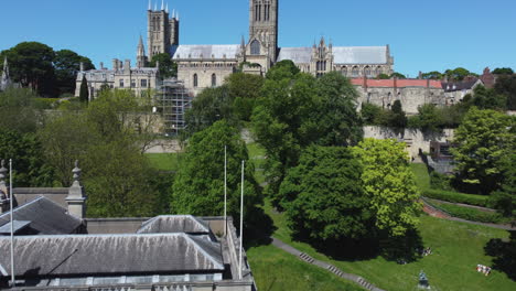 Establishing-Rising-Shot-of-The-Usher-Gallery-Revealing-Lincoln-Cathedral-in-Sunny-Conditions-UK