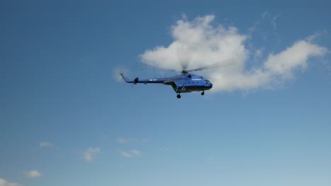 Civilian-Mi-8-helicopter-descending-for-landing-approaching-airfield-in-mountains