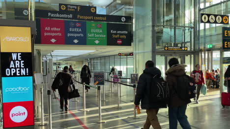 People-entering-the-Norwegian-Border-Control-at-Oslo-Airport-before-leaving-to-their-holiday-destination