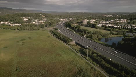 Aerial-over-a-park-at-Mudgeeraba,-a-suburb-on-the-Gold-Coast,-Australia