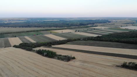 Aerial-Panorama-Of-Farmlands-With-Country-Road