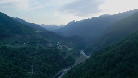 Mountain-valley-with-river-and-sky-in-Guguan-Taichung-Taiwan