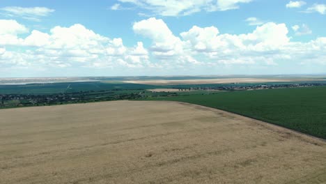 Panoramic-View-Over-Scenic-Agricultural-Fields-In-The-Countryside---drone-shot