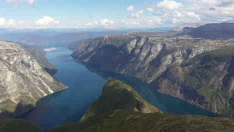 Drone-shot-of-beautiful-and-dramatic-fjords-and-steep-mountains-carved-out-by-glaciers-in-Norway