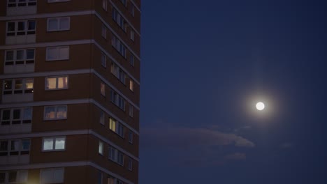London-tower-block-against-the-backdrop-of-the-night-sky-with-moon