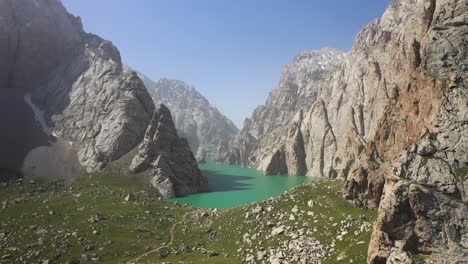 Epic-cinematic-drone-shot-of-the-Kel-Suu-lake-in-Kyrgyzstan,-wide-shot