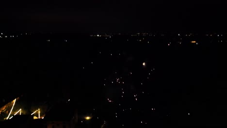 A-cinematic-drone-shot-of-some-fireworks-over-an-italian-villa
