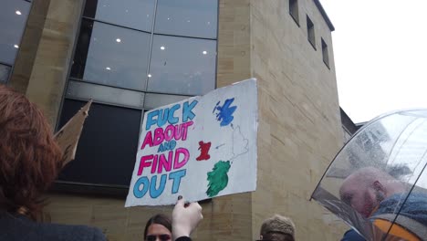 A-Transgender-activist-holding-up-a-homemade-political-banner