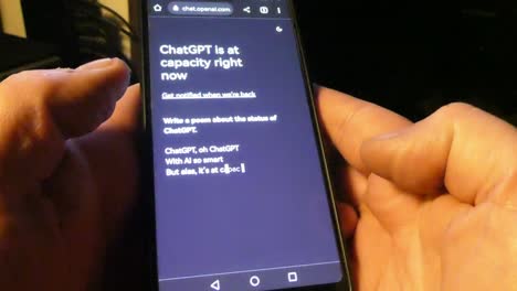 hands-scrolling-on-a-smartphone-using-Open-AI-technology