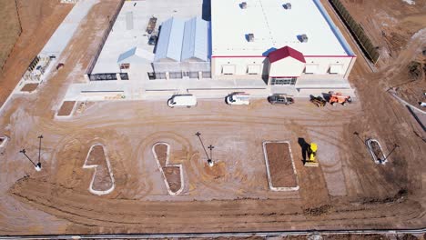 Aerial-pull-away-of-newly-constructed-Tractor-Supply-storefront-in-Pelham,-Alabama