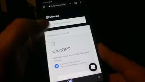 hands-scrolling-on-a-smartphone-using-AI-ChatGPT-technology