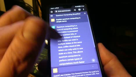 hands-scrolling-on-a-touchscreen-smartphone-using-AI-ChatGPT-technology-online