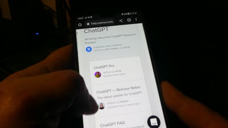 hands-scrolling-on-a-smartphone-using-Open-AI-ChatGPT-technology
