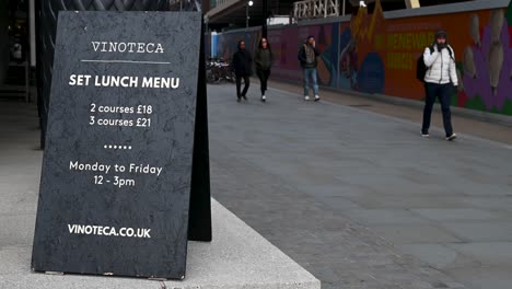 Walking-past-Vinoteca-and-their-Lunch-Menu,-London,-United-Kingdom