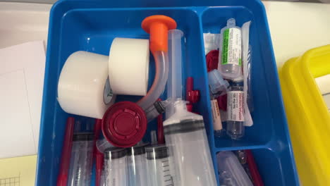 A-tray-of-syringes,-labelled-with-drugs-used-during-anaesthesia,-in-an-operating-theatre