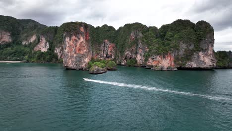 Speedboat-going-through-Tonsai-Bay-in-Krabi,-Thailand