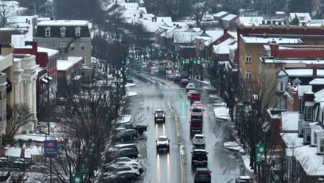 Long-aerial-zoom-of-main-street-of-small-town-in-America