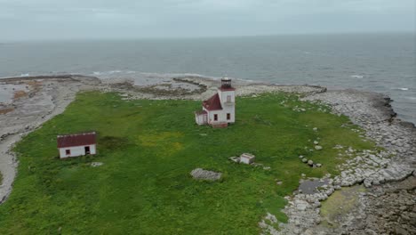 Abandoned-Lighthouse-on-creepy-Island,-Newfoundland---Push-In-Drone-Clip