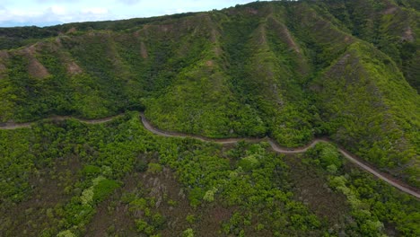 Aerial-zoom-in-on-huge-mountain-in-Molokai-Hawaii