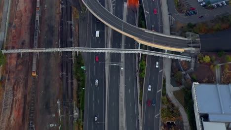 Tilt-up-Aerial-view-of-morning-traffic-on-Brisbane's-Inner-City-Bypass