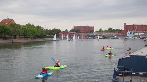 Recreational-Activity-With-Rowing-Boats-In-Bristol's-Harbourside,-England,-UK