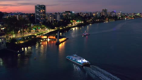 Aerial-view-of-Brisbane-City-Ferry-boat-Arriving-at-"Regatta"-terminal-in-Toowong-after-sunset