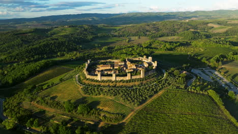 Monteriggioni-Walled-City-In-Scenic-Natural-Landscape,-Tuscany,-Italy---aerial-drone-shot