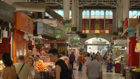 People-shopping-groceries-at-Spanish-Central-Valencia-Marketplace