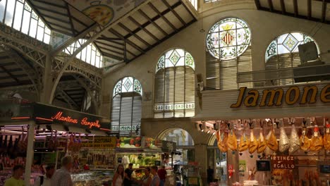 Early-morning-inside-Famous-Valencia-Central-Marketplace,-Spain,-meat-shop
