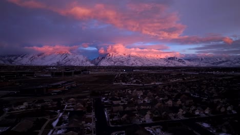 Colorful-clouds-at-sunset-over-Lehi,-Utah---aerial-parallax