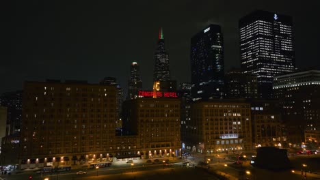 Aerial-view-towards-the-Congress-Plaza-Hotel-and-Convention-Center,-night-in-Chicago,-USA