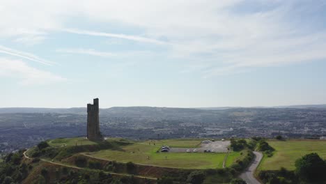 Drone-shot-of-the-Huddersfield-with-Castle-Hill-aka-Victoria-tower-in-the-foreground