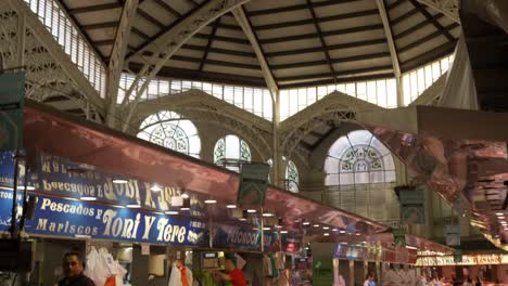 Seafood-shops-inside-Central-Valencia-Marketplace,-Spain,-Early-morning