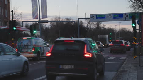 Autumn-day-at-Roslagstull-Stockholm,-traffic-jam,-cars-and-buses-busy