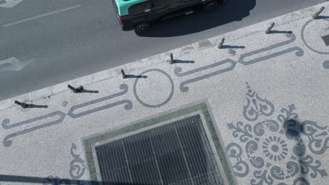aerial-orbit-view-of-Portuguese-pavement-or-cobblestones-on-Avenida-da-Liberdade-in-Lisbon,-Portugal
