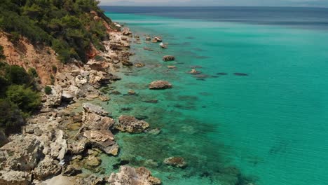 Sunny-day-on-the-coast-of-Halkidiki-with-blue-water-and-blue-sky
