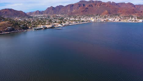 the-aerial-flight-going-down-in-Guaymas-bay,-Flynn-low